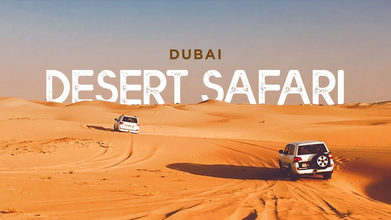 Dubai desert safari dune bashing adventure with 4x4 vehicles driving across golden sand dunes