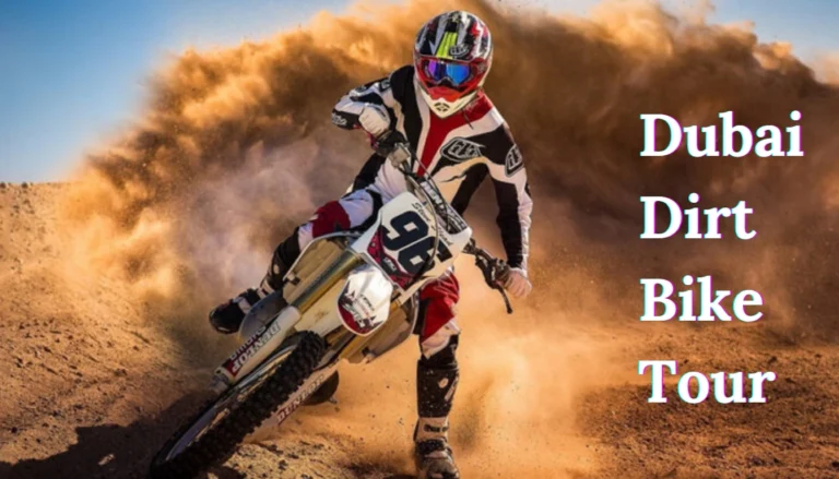 Dubai dirt bike tour rider speeding across desert dunes during guided off-road adventure