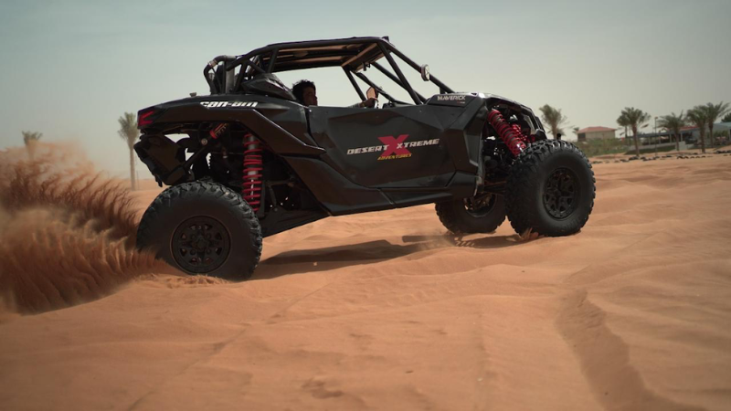 Can-Am Maverick dune buggy ride in Dubai desert during an off-road adventure tour